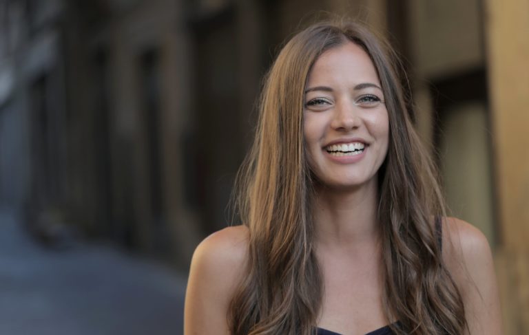 a woman smiling for the camera