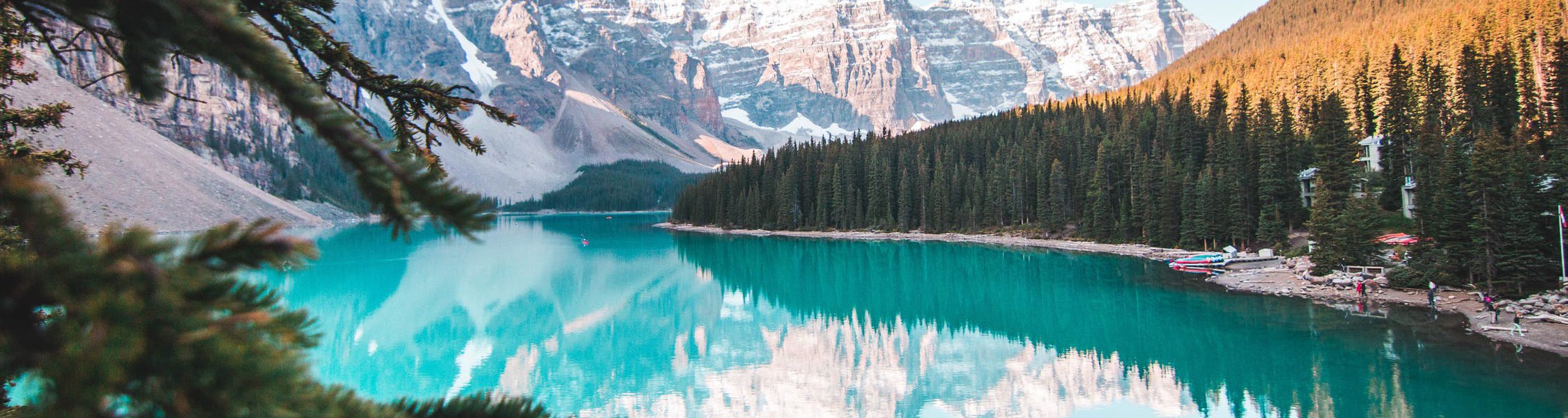 a large blue lake surrounded by trees