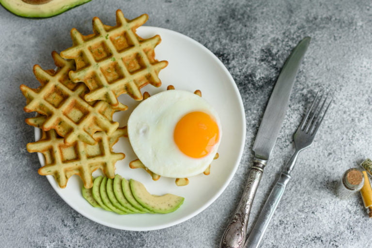Fresh delicious and nutritious breakfast with waffles with spinach